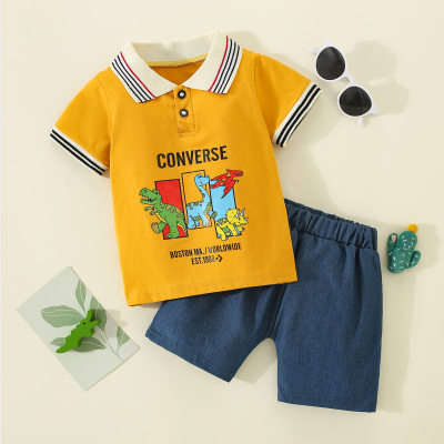 2-teiliges Kurzarm-Poloshirt aus reiner Baumwolle für Kleinkinder mit Buchstaben und Dinosauriern und einfarbigen Shorts