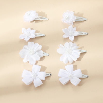 إكسسوارات شعر زهور بيضاء بسيطة للبنات