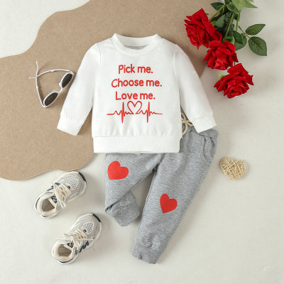 Children's clothing wholesale Valentine's Day boys and girls suits baby spring and autumn new long-sleeved sweatshirt love trousers two-piece set trendy