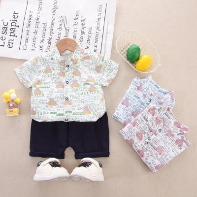 2-piece Toddler Boy Pure Cotton Allover Letter and Bear Printed Short Sleeve Shirt & Solid Color Shorts