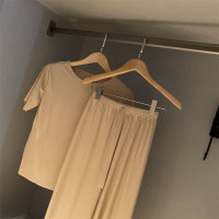 بيجاما نسائية جديدة من الحرير الصناعي بلون واحد، تتضمن معطفًا وبنطالًا للراحة والأناقة  مشمش