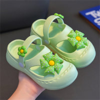 Zapatillas infantiles de flores.  Verde