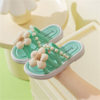 Thick-soled floral slippers worn with fairy-style Roman sandals  Green