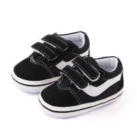 Baby Black and white pair of Velcro toddler shoes  Black