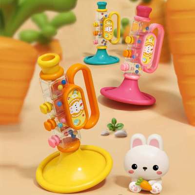 I giocattoli per bambini della tromba del fumetto che soffiano musica, il bambino può soffiare uno strumento musicale con fischio per tromba mini armonica