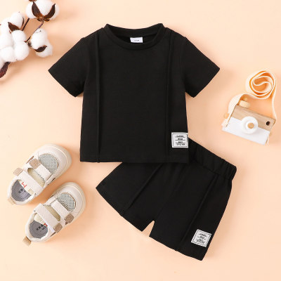 Camiseta e shorts de cor lisa de 2 peças para bebê menino