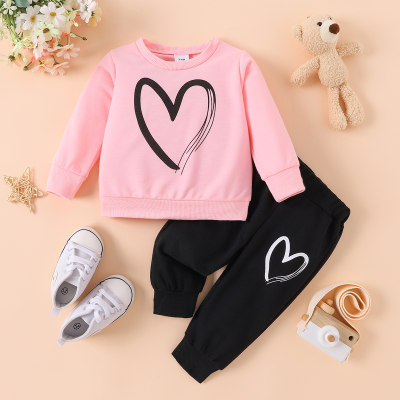 Round neck long sleeve heart print top and heart print trousers for infants and young girls, fashionable Valentine's Day two-piece suit