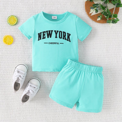 Novedad de verano, top y pantalones cortos con estampado de letras y cuello redondo, traje de dos piezas a la moda para bebés y niños pequeños
