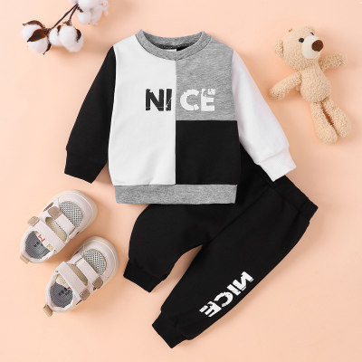Maglione e pantaloni a blocchi di colore con motivo a lettere da 2 pezzi per neonato