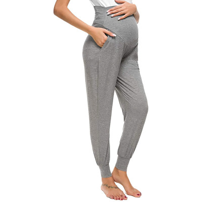 Pantalones de levantamiento de estómago de cintura alta de color sólido para mamá embarazada