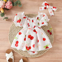 Lindo conjunto de bebé niña con vestido triangular con manga abullonada y pañuelo en la cabeza color cereza  Blanco