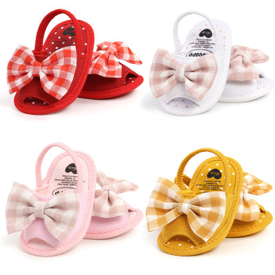 Chaussures de bébé à carreaux avec nœud papillon