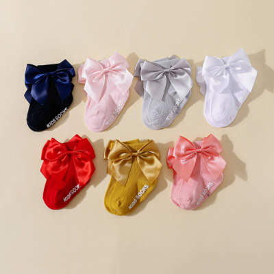 Calcetines antideslizantes con decoración de lazo de Color sólido de algodón puro para niña bebé