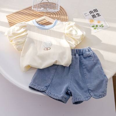 T-shirt a maniche corte da bambina in stile coreano T-shirt estiva nuova semplice e versatile pantaloncini in denim elegante abito a due pezzi per bambini