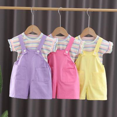 A drop-shipping girl's sweet striped top short-sleeved T-shirt children's clothing children's summer solid color suspender shorts suit