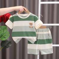 ملابس صيفية جديدة للأطفال بنمط كوري للتصدير، تتميز بخطوط أنيقة، مصممة للأولاد والبنات، تتألف من قطعتين بأكمام قصيرة خفيفة ومزينة برسوم كرتونية مرحة  أخضر