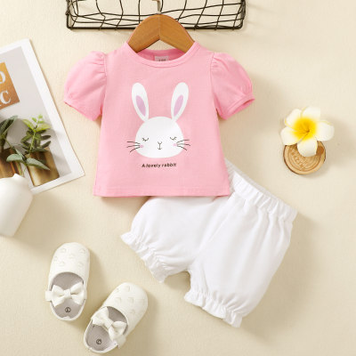 Camiseta de manga corta abullonada con estampado de conejo para niña de 2 piezas y pantalones cortos de color sólido