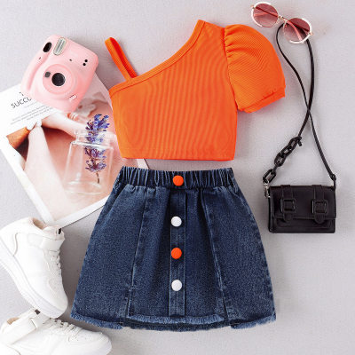 Orange top + denim skirt