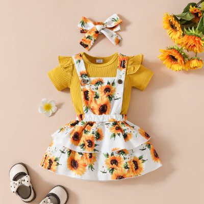 Top de color sólido de manga corta para bebé de verano + conjunto de falda con tirantes de flores + diadema