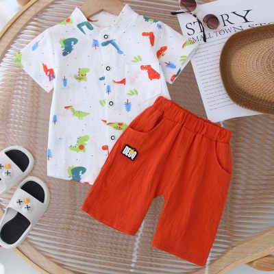 Camisa de manga corta con estampado de dinosaurios de algodón puro para niños pequeños de 2 piezas y pantalones cortos de color sólido