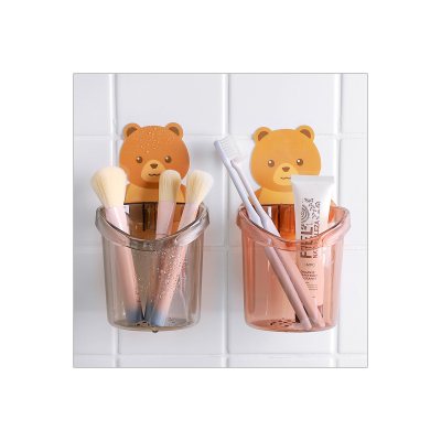 Popular soporte para cepillo de dientes de oso para baño de Douyin, adhesivo sin costuras montado en la pared, estante de almacenamiento para abrazo de oso, soporte para cepillo de dientes para niños