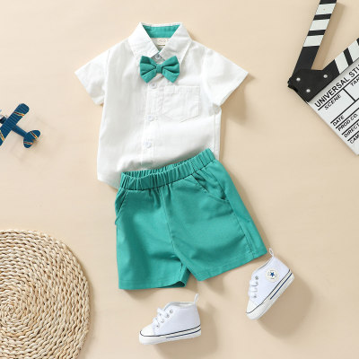 Camisa y pantalones de manga corta con decoración de lazo para bebé