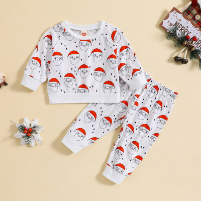 T-shirt e pantaloni con motivi a stella di Babbo Natale per bambini di Natale