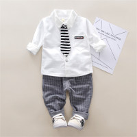 2-piece Toddler Boy Solid Color Letter Printed Lapel Shirt & Striped Straight Pants  White